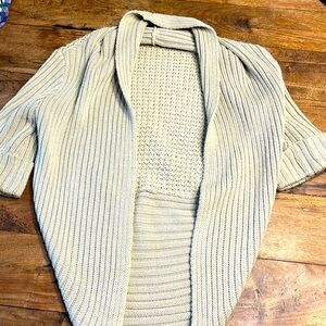 The limited women’s Sweater size extra small color beige